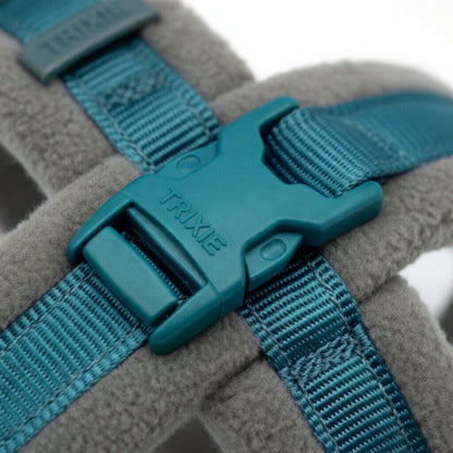 Detalle hebilla de seguridad TRIXIE arnés ergonómico azul petróleo - cierre rápido resistente